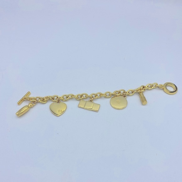 Signed Estée Lauder Gold Tone Charm Bracelet With Five Charms NWOT Size 7” - Picture 9 of 11